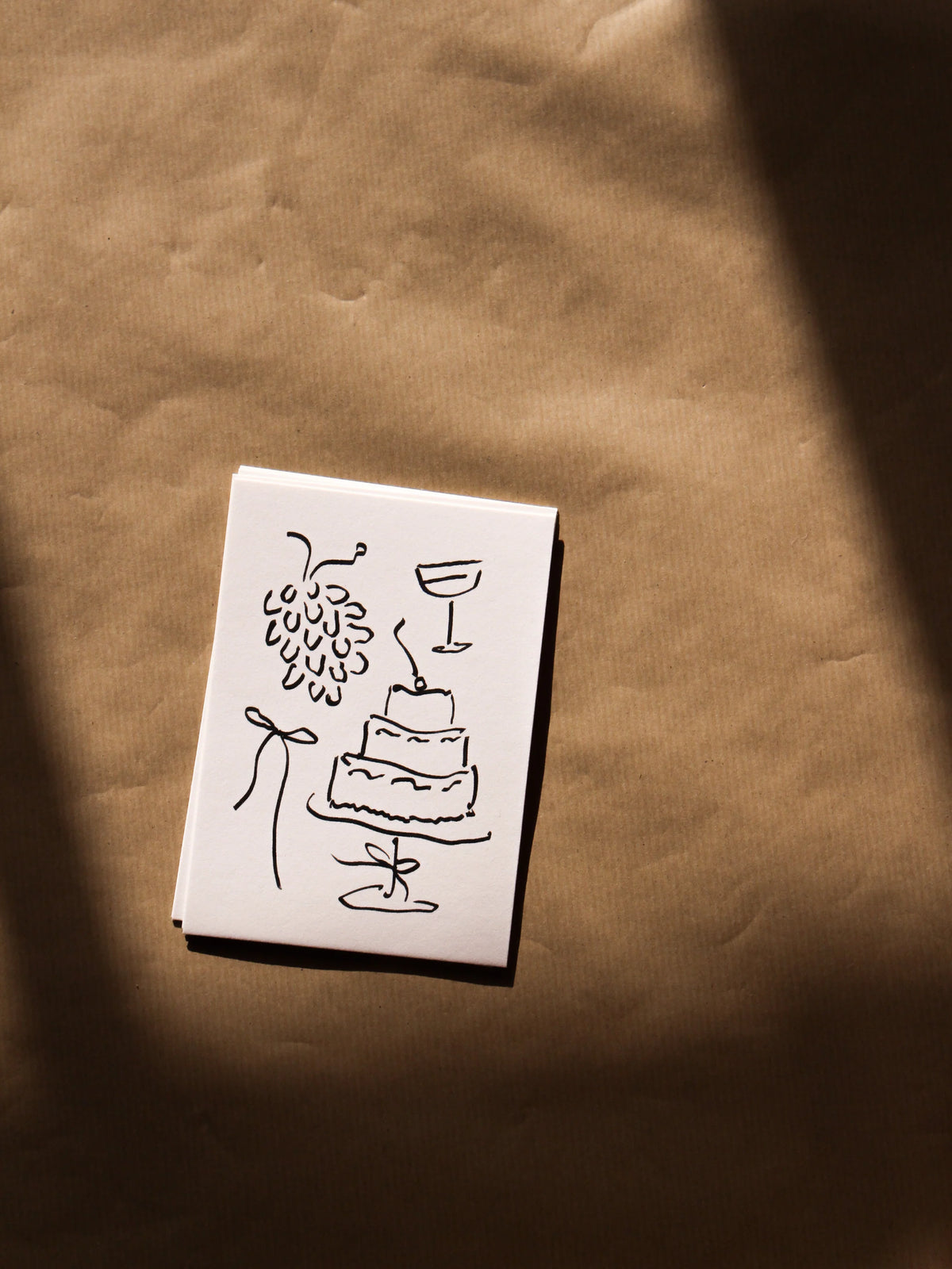 Postkarte 'Trauben und Torte'